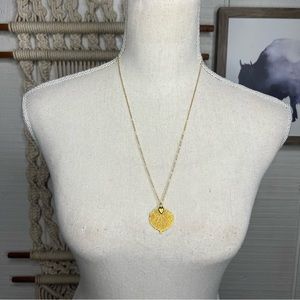 Vintage gold tone leaf pendant necklace on gold tone chain